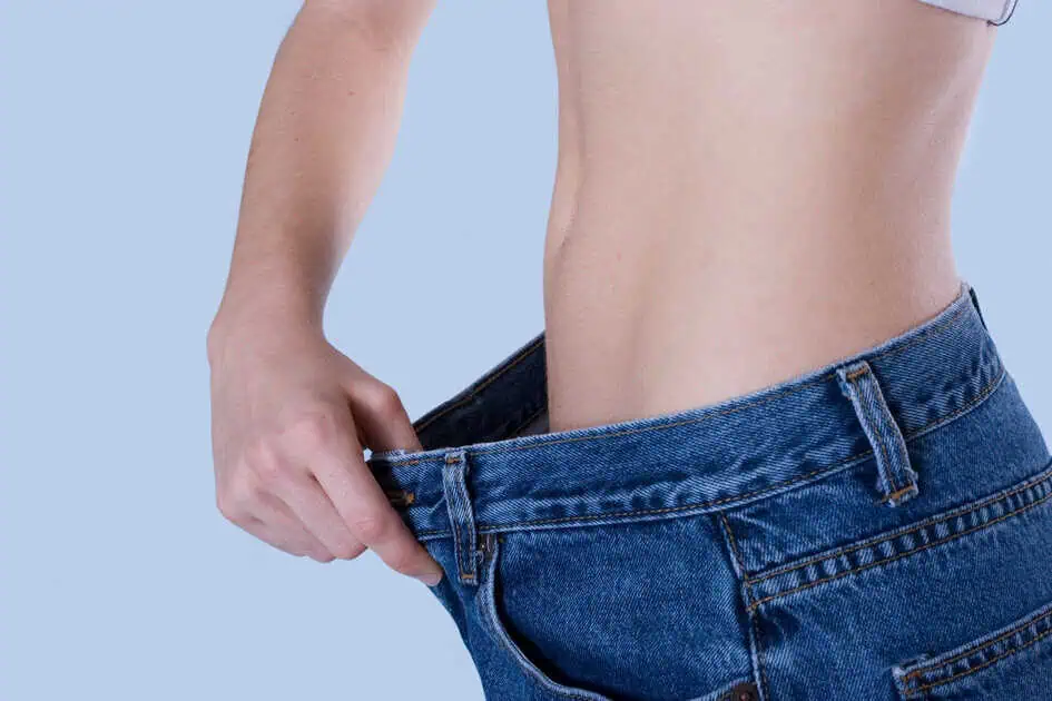 Woman tracking progress during medical weight loss program